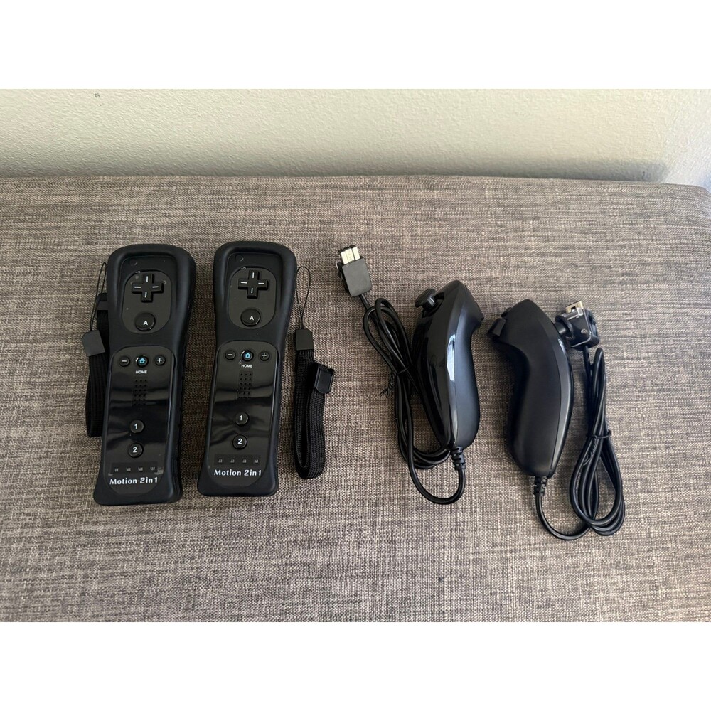 New Wii 2-in -1 Motion Plus Set of two Controllers and Two Nunchucks.